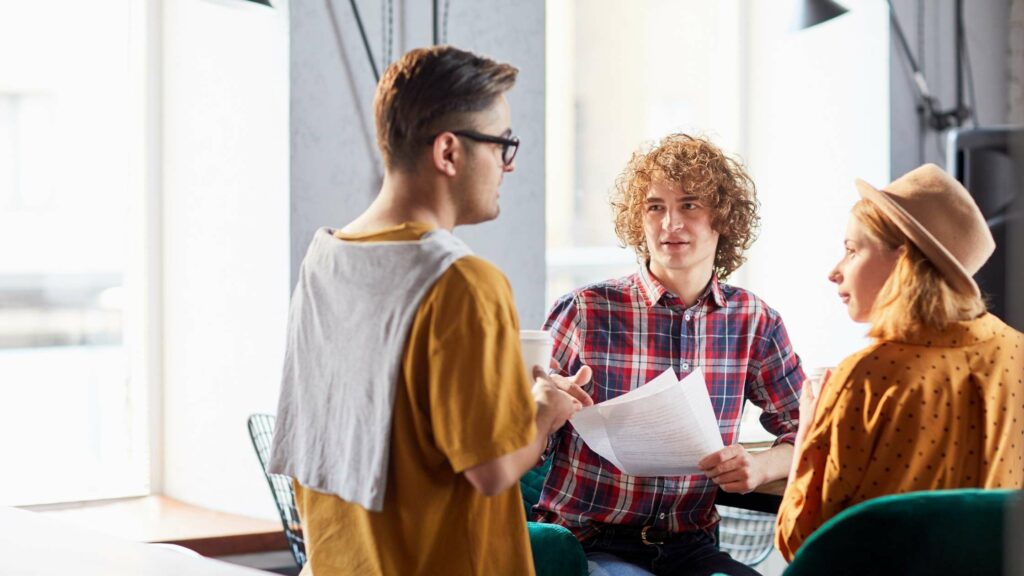 manager discussing with employees